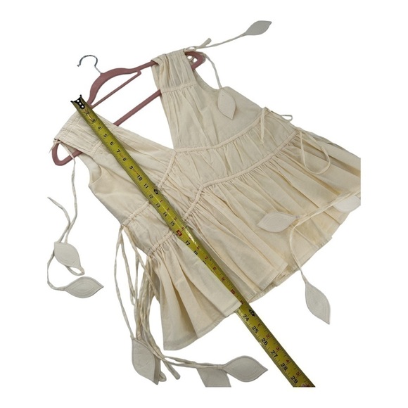 Tory Burch
Sleeveless Smocked Peplum Top COLOR New Ivory size 0 - Picture 11 of 17